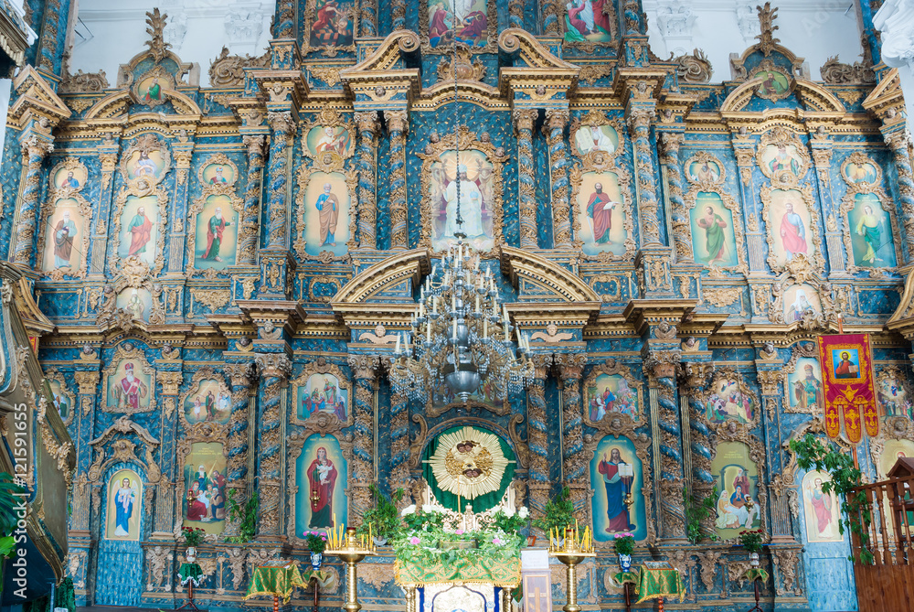 Wall mural Wooden carved iconostasis in the Orthodox Church