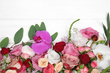 Fresh flowers on  wooden background