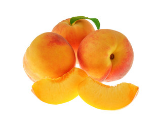 Fresh peaches on a white background