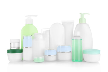 Different cosmetic bottles isolated on white