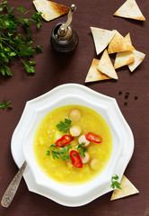 Lentil soup with curry sausages.