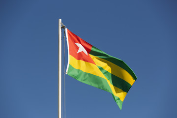 National flag of Togo on a flagpole