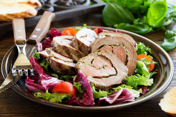 Roast beef with pesto and salad.