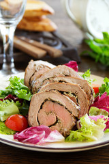 Roast beef with pesto and salad.