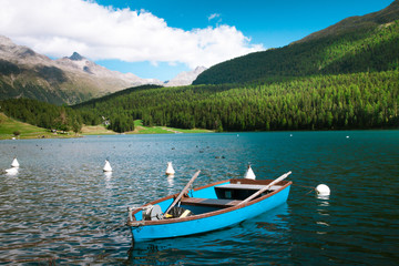 Fototapeta na wymiar Sankt Moritz Lake with boats, Grisons, Switzerland