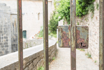 Closeup of closed gate at the castle / old town of Girona, Costa