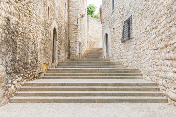 Fototapeta na wymiar Deserted stairs in the old town of Girona