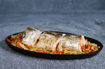 Baked fish with vegetables
