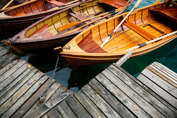 Fototapeta na wymiar Traditional wooden boats on Lake Bled, Slovenia.