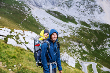 Family on a trekking day in the mountains. Mangart, Julian Alps, National Park, Slovenia