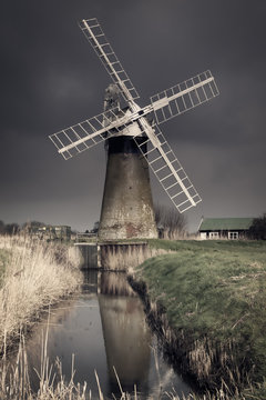 St Benet's windmill on the river Thurne, Norfolk, UK just before the storm.