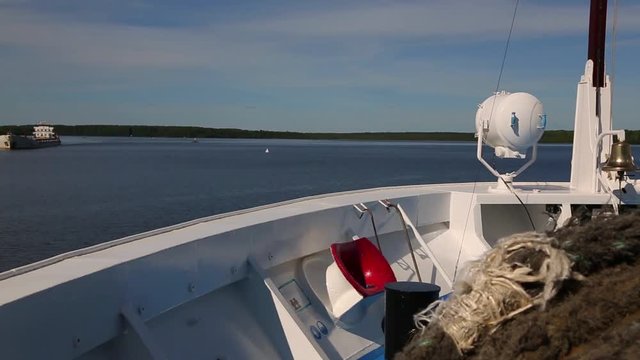 Cargo ship goes on the Svir River in northern Russia