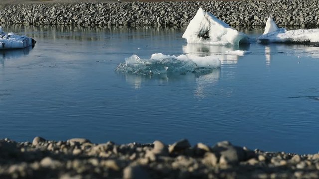 Ice floating to ocean, glacier lagoon in Iceland