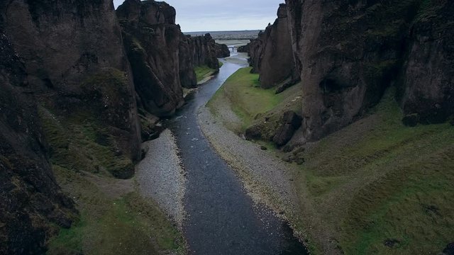 Fjadrargljufur canyon, landscape of mountains cliffs and river, Iceland