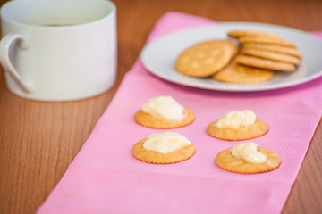 crackers biscuits on wooden background