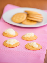 crackers biscuits on wooden background