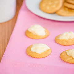 crackers biscuits on wooden background