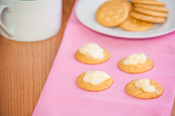crackers biscuits on wooden background