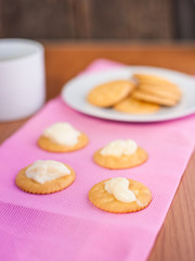 crackers biscuits on wooden background