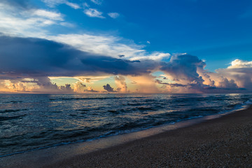 peaceful dawn/Peaceful ocean sunrise with dramatic clouds and sandy beach