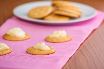 crackers biscuits on wooden background