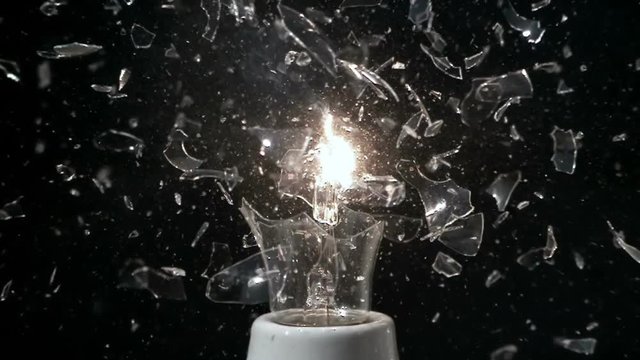 Glass Light Bulb Breaking in Super Slow Motion With Filament Smoke