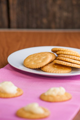crackers biscuits on wooden background