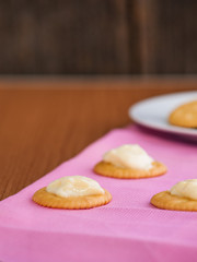 crackers biscuits on wooden background