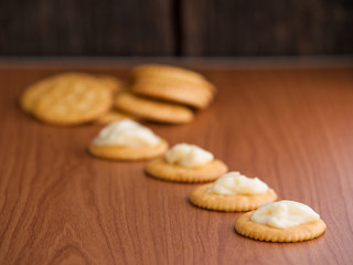 crackers biscuits on wooden background
