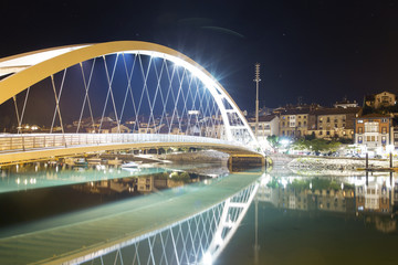 The bridge and the river of Plentzia town at night. Plentzia, Basque Country, Spain. Long exposure shot.