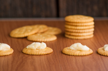 Fototapeta na wymiar crackers biscuits on wooden background