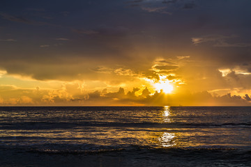 Stunning sunrise/Beautiful tropical sunrise on the beach.