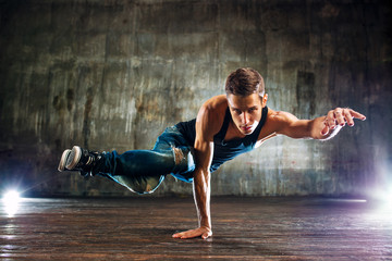 Young man break dancing