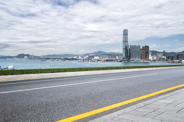 modern buildings in hong kong from empty road