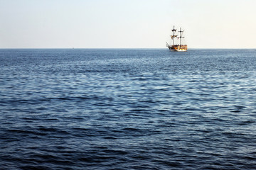 Tourist pirate ship on the horizon of the Mediterranean Sea in A