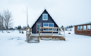 House in Scandinavian style in the winter season.