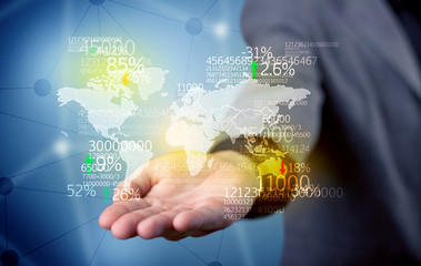 Business person holding earth statistics map