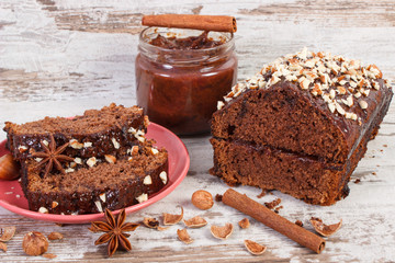 Gingerbread or dark cake with chocolate, cocoa and plum jam, delicious dessert