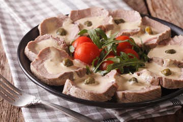 Italian Beef Vitello tonnato with tuna sauce close-up. horizontal
