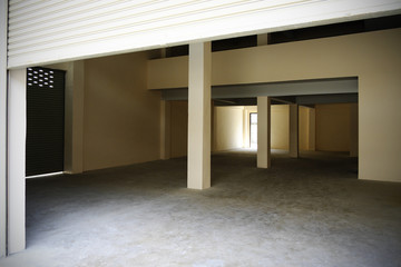 Empty unfinished house with white walls in a new constructed.