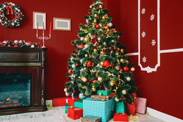 Defocused background Living room with christmas tree and fireplace