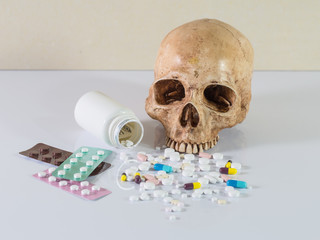 Still life, skull and medicine.