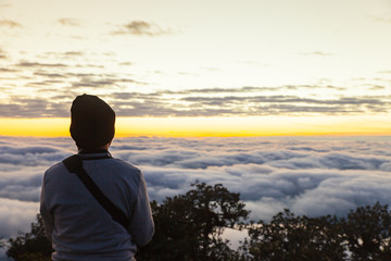 Fototapeta premium Man look for sunrise in Doi Luang Chiang Dao,Chiang mai.