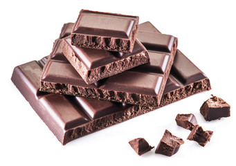 Pieces of chocolate bar isolated on a white background.