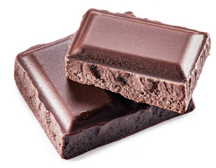 Two pieces of chocolate bar isolated on a white background.