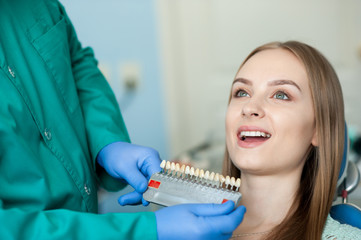 Dentist examining a patient's teeth