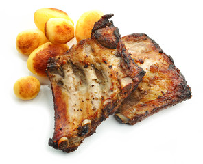 grilled pork ribs and potatoes