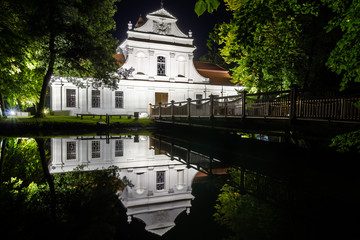 Saint John of Nepomuk Catholic Church in Zwierzyniec, Poland at night - 121624284