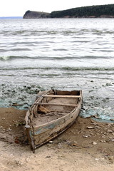 
Old broken boat on the river