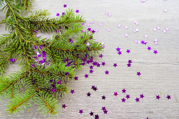 fir branch on wood